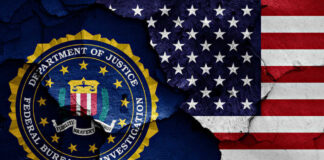 FBI seal superimposed on cracked American flag.