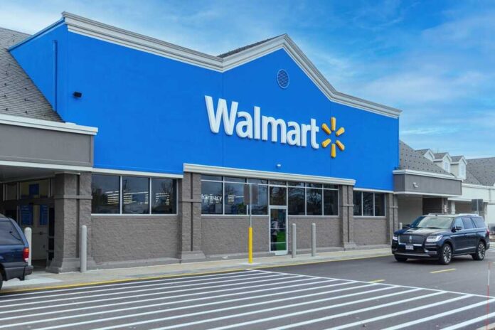 shutterstock_2415634825.jpg featured image Walmart store exterior with parked cars