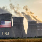 Cooling towers with USA flag and smoke clouds