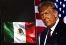 Donald Trump with Mexican flag on phone.