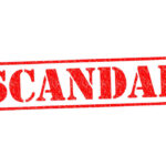 NFL Head Coach Sued – Hacking Scandal Erupts Red stamp with the word scandal