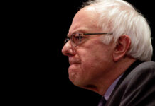 Bernie Sanders in glasses.