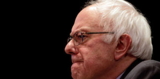 Bernie Sanders in glasses.