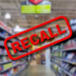 Massive Sausage Recall Hits Nationwide Blurred store aisle with RECALL stamp overlay