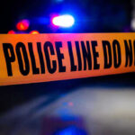 Teen Football Prodigy Gunned Down – Shocking Loss Police tape with flashing lights in the background