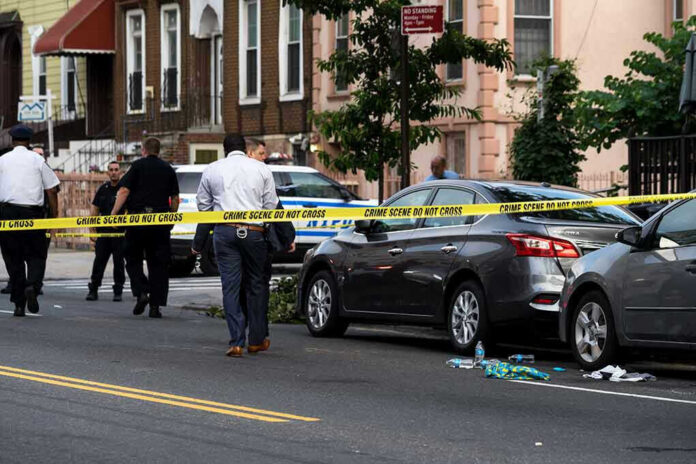 Police and crime scene tape on city street