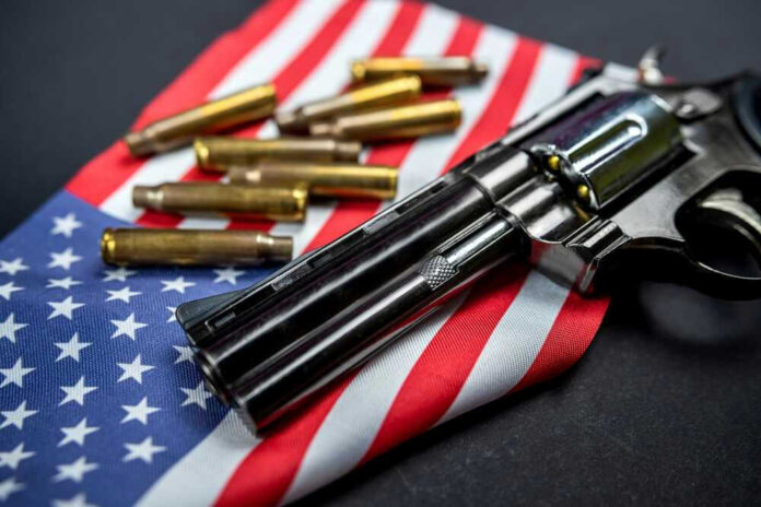 Revolver and bullets on American flag background