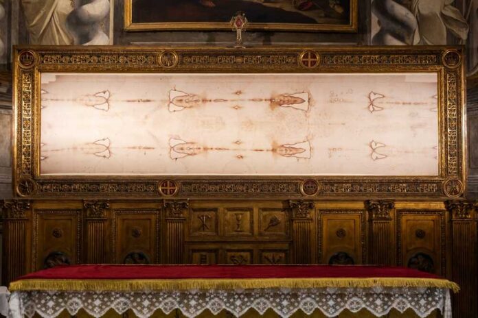 The Shroud of Turin displayed in a museum setting