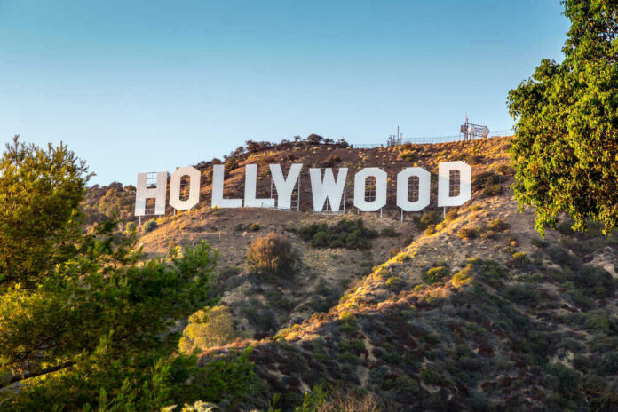 Hollywood sign on a sunny hillside.