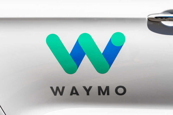 Waymo logo displayed on a vehicle