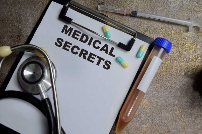 Medical documents with a stethoscope, pills, and a test tube