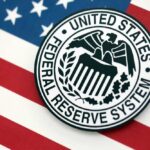 Federal Reserve System emblem on an American flag background