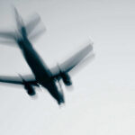 Airplane in flight with motion blur.