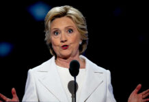 Hillary Clinton Under Oath: “No Recall” A female politician delivering a speech at a podium