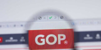 Magnifying glass focusing on GOP website logo.