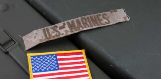 War Machine ROARS — The Marines Have Arrived Military patches including a US Marines insignia and an American flag on a green surface