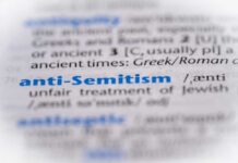 Close-up of a dictionary entry for the term 'anti-Semitism'