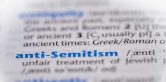 Close-up of a dictionary entry for the term 'anti-Semitism'