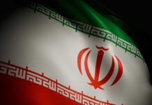 The flag of Iran displayed with its green, white, and red colors