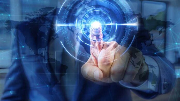 shutterstock_2652108083.jpg Businessman interacting with a digital interface displaying a global map