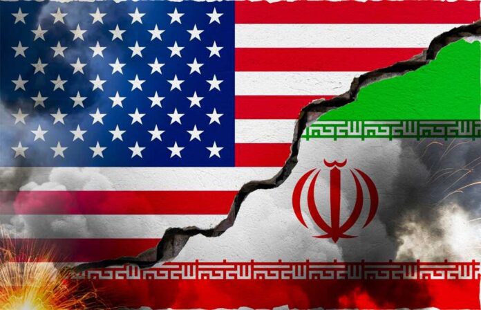 shutterstock_2745194107.jpg A cracked wall displaying the flags of the USA and Iran, symbolizing conflict