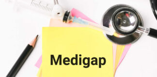 A yellow sticky note with the word 'Medigap' surrounded by medical tools and colored paper