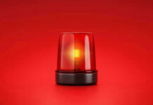 OUSTED After 16 Years — LANDSLIDE Red emergency light on solid red background.