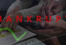 Hands using a smartphone with a financial chart and the word 'BANKRUPT' overlayed