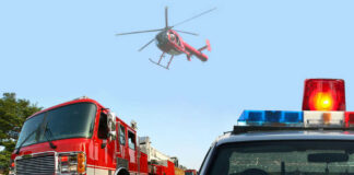 Tornado Emergency — Dozens Trapped Fire truck police car and helicopter at scene