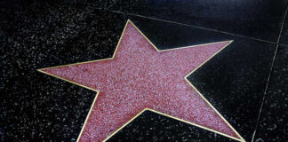 Outrage: Light Sentence for Perry’s Death A red star embedded in a black sidewalk, part of the Hollywood Walk of Fame