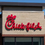 Chick-fil-A restaurant sign on a brick building