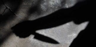 Knife Attack Turns ‘Self-Defense’ Into Murder Shadow of a hand holding a knife on a textured surface