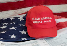 MAGA Rally Replaces America’s Birthday? Red Make America Great Again hat on American flag