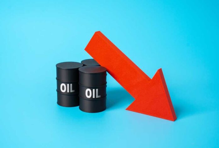 Three black oil barrels with the word 'OIL' and a red downward arrow