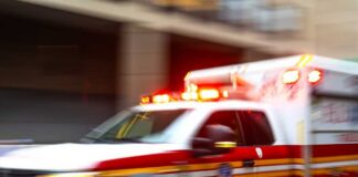 VIDEO: Hospital Shooting Leaves Bodies On the Floor Hospital corridor with IV drip and healthcare worker.