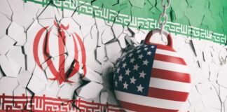 Iran Sparks Firestorm: U.S. Hits Back Hard A wrecking ball painted with the American flag is breaking through a wall featuring the Iranian flag