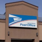 Row of blue United States Postal Service mailboxes