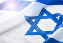 NYC Mayor’s Bold Arrest Plot Craters Israeli flag with a sun flare.