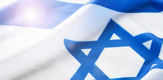 Israeli flag with a sun flare.