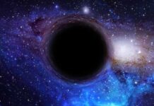 Milky Way Molecule Shocks Biologists A black hole surrounded by a colorful galaxy filled with stars