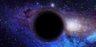 Milky Way Molecule Shocks Biologists A black hole surrounded by a colorful galaxy filled with stars