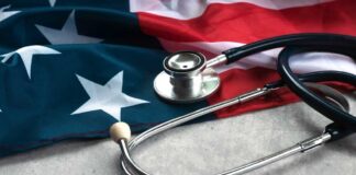 A stethoscope resting on an American flag