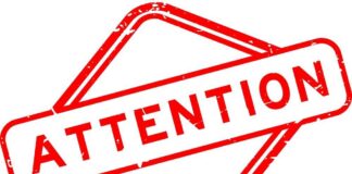 Puerto Rico Crisis Deepens — Taps Dry Red attention sign with the word 'ATTENTION' in bold letters