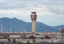 Airport Foot-Wash Fight Erupts Airport control tower with mountains in the background