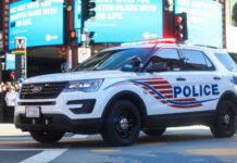 Masked Trio Nab THIS Sports Star’s Luxury Car Police SUV with lights on in an urban environment
