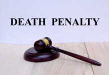 Death Penalty Dropped In THIS Case? A wooden gavel resting on a block with the words 'DEATH PENALTY' in bold above it