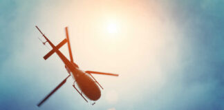 VIDEO: News Chopper Explodes – 3 Dead A helicopter flying against a bright sky
