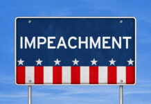 NOW: Impeachment Threat Looms Sign displaying the word 'IMPEACHMENT' with a patriotic design
