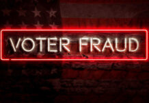 DOJ Drops Election Fraud Bombshell Neon sign reading Voter Fraud on American flag background.
