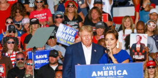 Donald Trump at a rally with a woman speaking at the podium; Alexandros Papadiamantis, Margarita Stolbizer, and David Lowy are present in the crowd